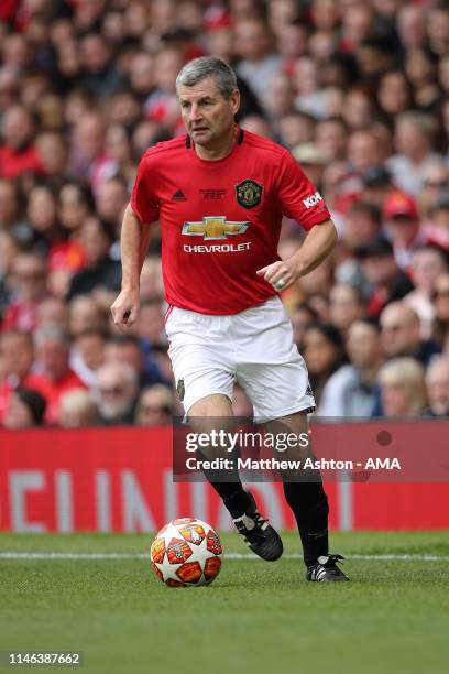 Denis Irwin of Manchester United '99 Legends during the Manchester United '99 Legends v FC Bayern Legends match at Old Trafford on May 26, 2019 in...