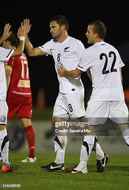 Tim Brown of the All Whites is congratulated by Jeremy Brockie of the All Whites after he scored during the friendly match between the New Zealand...