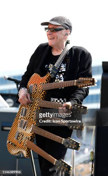Rock and Roll Hall of Fame band member Rick Nielsen of Cheap Trick performs prior to the running of the 60th annual Coca-Cola 600 on May 26, 2019 at...