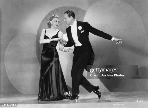 American dancers, singers and actors Ginger Rogers and Fred Astaire dancing in a scene from 'Roberta' , directed by William A. Seiter, 1935.