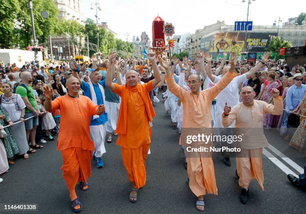 Ukrainian devotees of the International Society for Krishna Consciousness pull the chariot's rope during the Ratha Yatra Festival or Chariot Festival...
