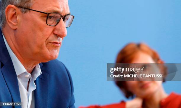 Bernd Riexinger and Katja Kipping, co-leaders of Germany's left-wing Die Linke party, address a press conference in Berlin on May 27 one day after...