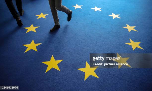 Carpeting in the colours of the EU flag can be seen in the Konrad Adenauer House in Germany the day after the European elections. Photo: Michael...