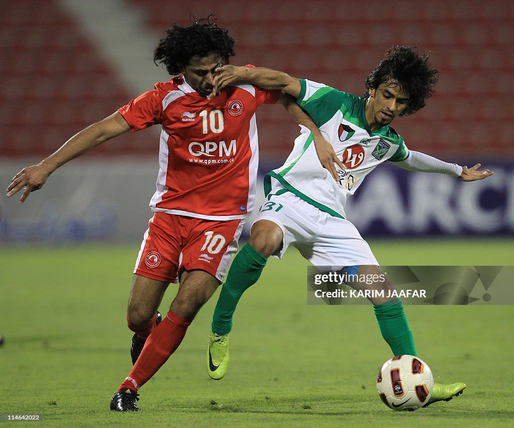 Qatar's Al-Arabi player Walid Hamza (L)