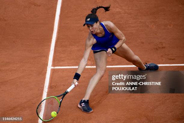 Romania's Sorana Cirstea returns the ball to Slovenia's Kaja Juvan during their women's singles first round match on day two of The Roland Garros...