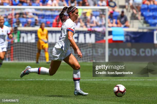 United States of America forward Alex Morgan controls the ball during the 1st half of the International Friendly match between the U.S. Women's...