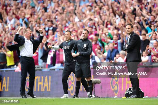 Dean Smith the head coach / manager of Aston Villa and Aston Villa Assistant head coach John Terry celebrate after their team scored to make it 1-0...