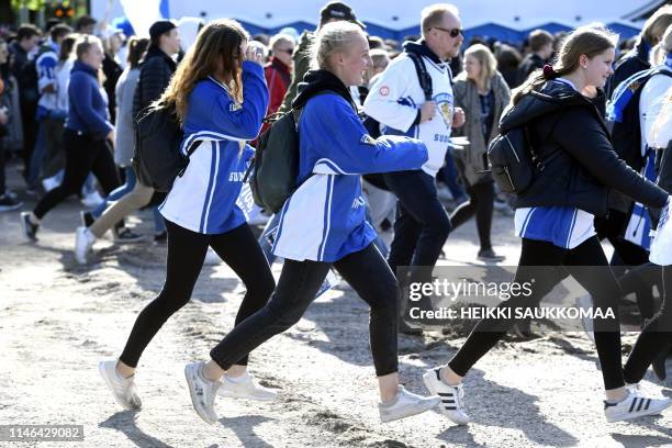 Finnish hockey fans gather to celebrate with the Finnish ice hockey team in Helsinki, Finland on May 27 a day after they won the 2019 IIHF Ice Hockey...