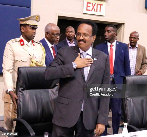 President of Somalia, Mohamed Abdullahi "Farmajo" Mohamed greets the crowd during a gathering with Somalians at Sandton Convention Centre within his...