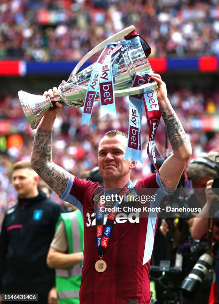 Glenn Whelan of Aston Villa celebrates with the trophy after winning the Sky Bet Championship Play-Off Final match between Aston Villa and Derby...