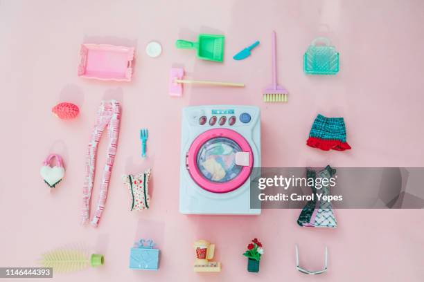 collection of dolls accesories in pink background.top view - plastic toy stock pictures, royalty-free photos & images