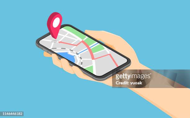 ilustrações de stock, clip art, desenhos animados e ícones de flat 3d isometric hand holding smartphone with pinpoint on the map application - gps