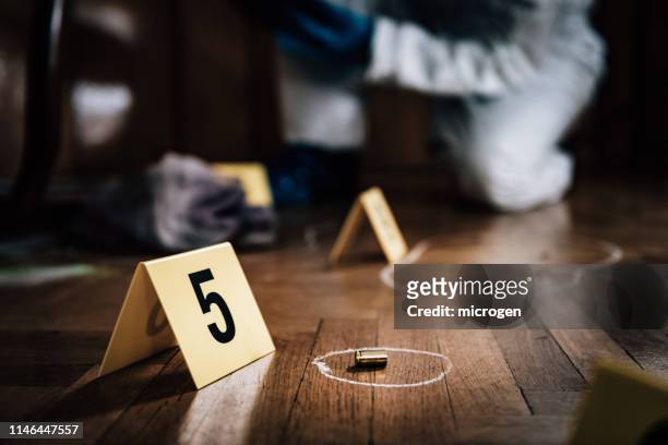 close-up of number at crime scene - detective stock pictures, royalty-free photos & images