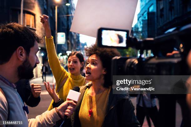 young protesters - democratic caucus stock pictures, royalty-free photos & images