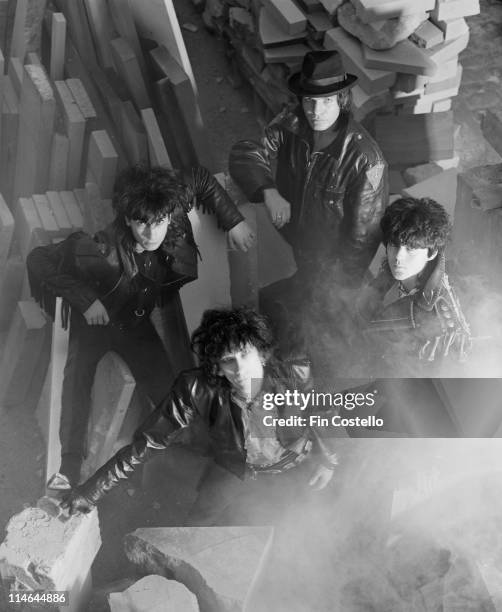 Post punk group The Lords Of The New Church posed in a stonemason's yard in Islington, London in October 1984. Clockwise from top: Brian James, Nicky...