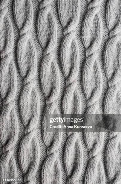 grey knitted fabric texture, top view - fleece pullover stock pictures, royalty-free photos & images