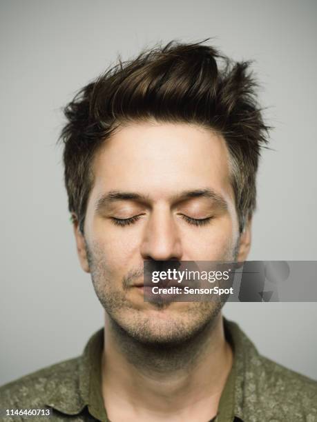 real caucasian man with blank expression and eyes closed - eyes close up stock pictures, royalty-free photos & images