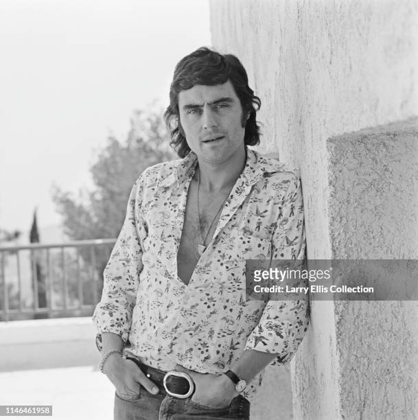 English actor Ian McShane pictured wearing an open neck shirt with shark tooth medallion in 1973. Ian McShane currently appears in the film the Last...