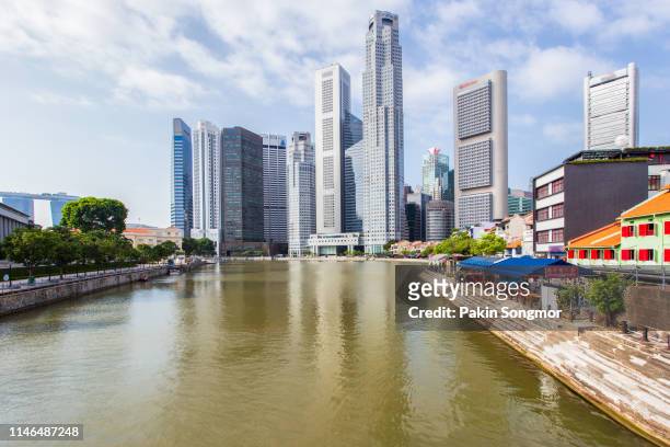 landscape of the singapore financial district and business building - singapore city day stock pictures, royalty-free photos & images