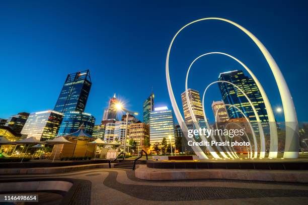 perth city waterfront during twilight night in perth, western australia, australia. - perth landmarks stock pictures, royalty-free photos & images