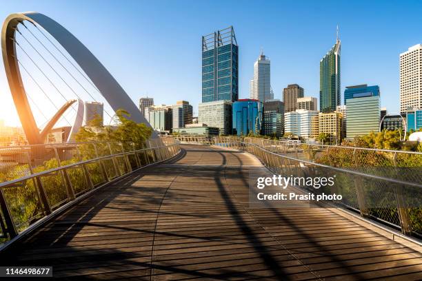 perth city waterfront during sunset in perth, western australia, australia. - perth cityscape stock pictures, royalty-free photos & images