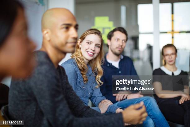 multiracial  business group in a meeting - 20 to 35 year old in class stock pictures, royalty-free photos & images