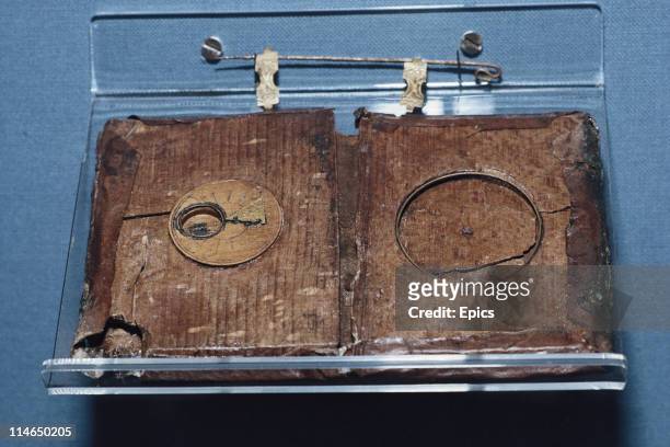 Compass case which was salvaged from the wreck of the Mary Rose warship which was salvaged from the sea bed on display at the Mary Rose Centre,...