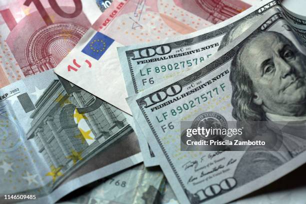 money - dollar and euro bills - dollar sign stock-fotos und bilder