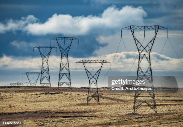 power lines, iceland - power mast stock pictures, royalty-free photos & images