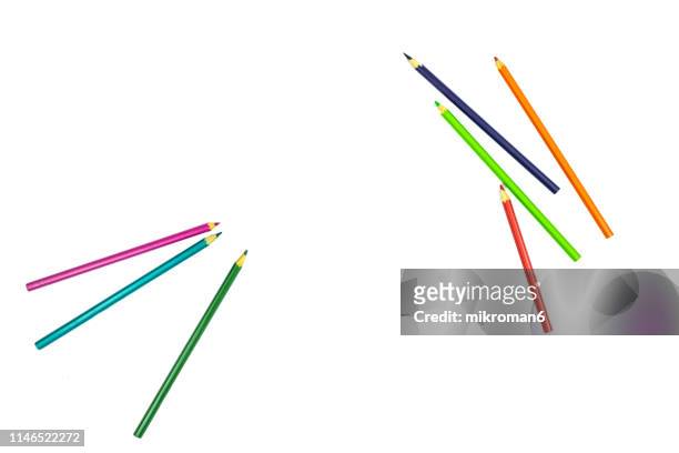 coloring pencils on white page - material escolar fotografías e imágenes de stock