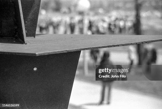 Closeup of a bullet hole left in a metal sculpture after the Ohio National Guard opened fire on antiwar protesters at Kent State University, Kent,...