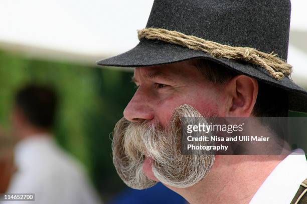a man getting ready for the beer fest in munich. - bavaria photos et images de collection