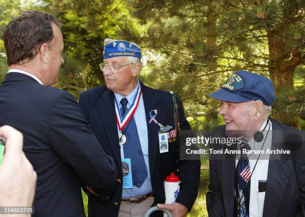 Tom Hanks shaking hands of US Veterans during D-DAY 60th Anniversary Celebration: ColleVille - Omaha Beach United States/France Ceremony at Omaha...