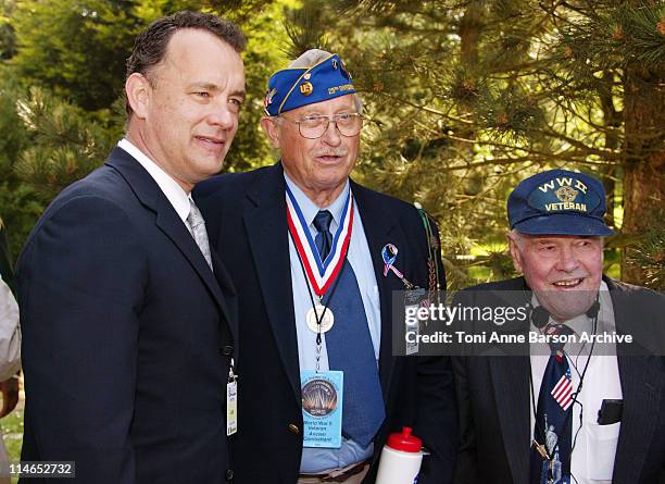 Tom Hanks shaking hands of US Veterans during D-DAY 60th Anniversary Celebration: ColleVille - Omaha Beach United States/France Ceremony at Omaha...