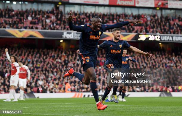 Mouctar Diakhaby of Valencia celebrates after scoring his team's first goal during the UEFA Europa League Semi Final First Leg match between Arsenal...