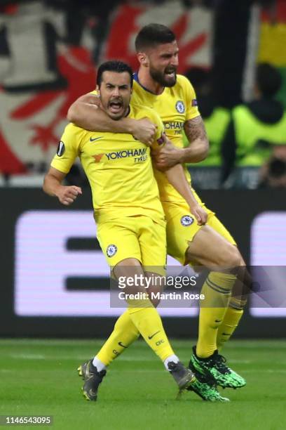 Pedro of Chelsea celebrates after scoring his team's first goal with Olivier Giroud during the UEFA Europa League Semi Final First Leg match between...