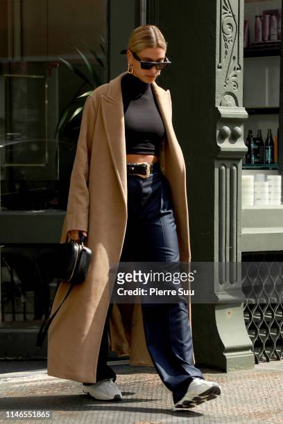 Hailey BIeber comesz out of a Hairsalon in Soho on May 02, 2019 in New York City.
