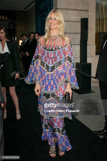 Supermodel Claudia Schiffer leaves the CHANEL J12 cocktail on Place Vendome on May 02, 2019 in Paris, France.