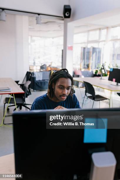Men In Computer Man Working In Front Of Computer Photos and Premium High Res Pictures ...