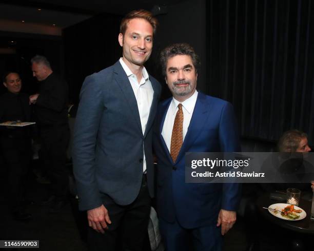 Michael Werwie and Director Joe Berlinger attend the reception for Netflix's "Extremely Wicked, Shockingly Evil and Vile" Tribeca Film Festival...