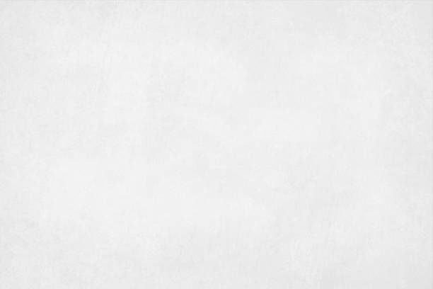 a horizontal vector illustration of a plain blank white colored blotched background - scratched paper stock illustrations