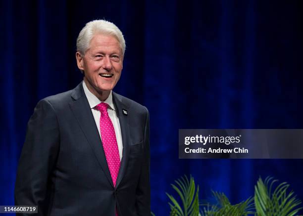 Former President Bill Clinton on stage during "An Evening with President Bill Clinton and former Secretary of State Hillary Rodham Clinton" at Rogers...