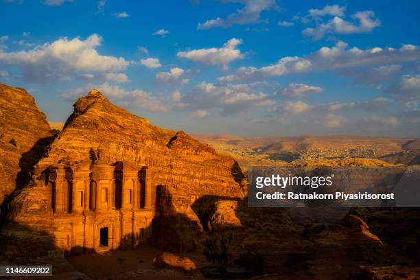 stunning view of the ad deir - monastery in the ancient city of petra. petra is a unesco world heritage site, historical and archaeological city in southern jordan - petra jordan stock pictures, royalty-free photos & images