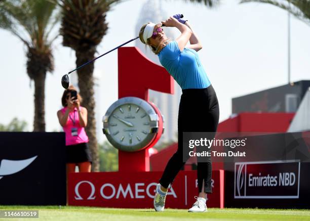 Paige Spiranac of United States tees off from the 1st hole during Day Three of the Omega Dubai Moonlight Classic at Emirates Golf Club on May 03,...