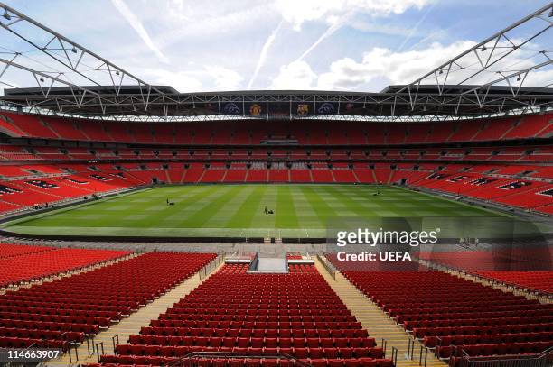 In this handout image provided by UEFA, final preparations are made to the pitch at Wembley Stadium for the Champions League Final, May 24, 2011 in...