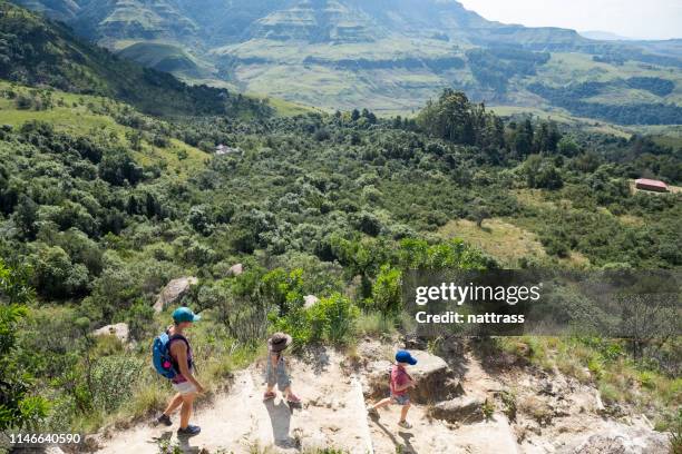 mother hikes with her kids - drakensberg mountain range stock pictures, royalty-free photos & images