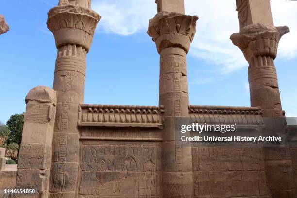 Photograph taken of Philae, an island in the reservoir of the Aswan Low Dam, Egypt. Philae was initially located near the expansive First Cataract of...