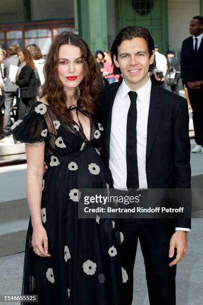Keira Knightley and James Righton attend the Chanel Cruise Collection 2020 : Front Row at Le Grand Palais on May 03, 2019 in Paris, France.