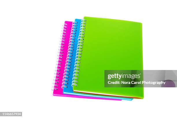 notepad on white background - pile of books white background stockfoto's en -beelden