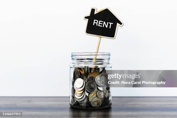 saving for rent - house rental bildbanksfoton och bilder